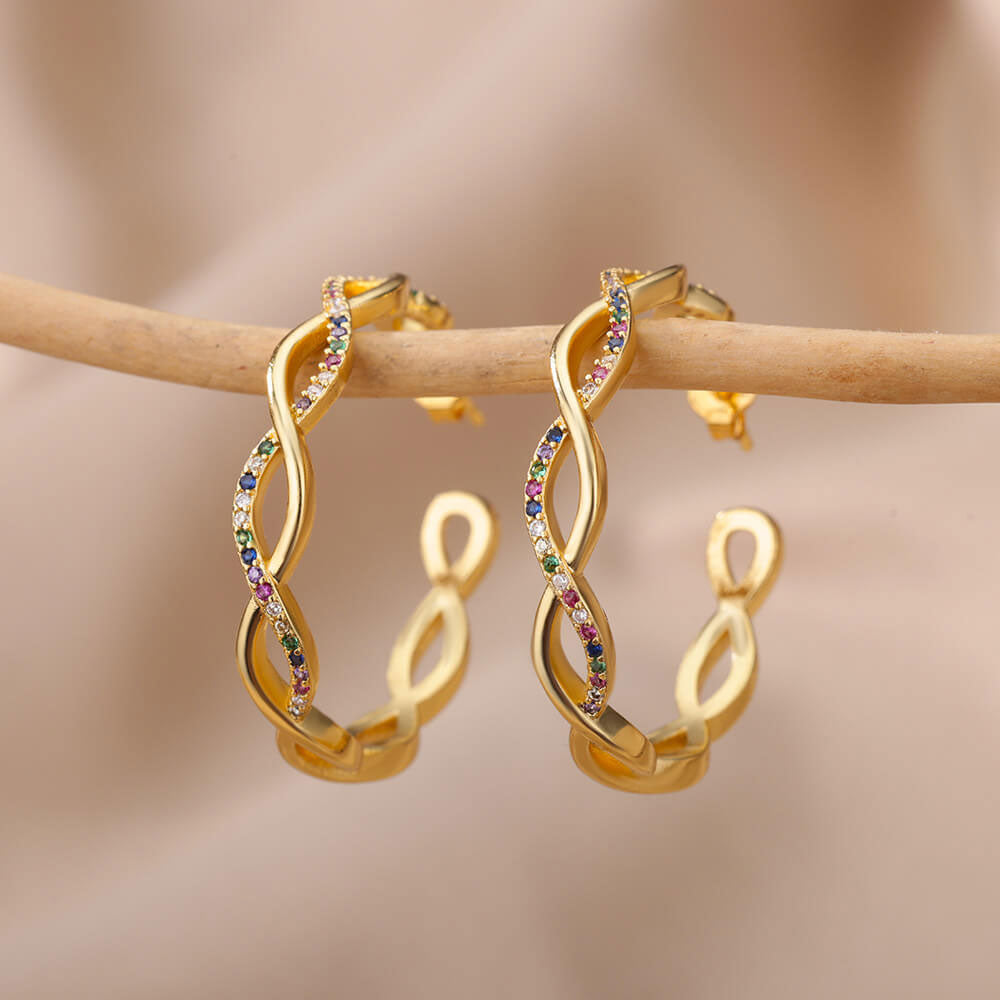 Julenyssa | Wellenohrringe aus 18K Gold