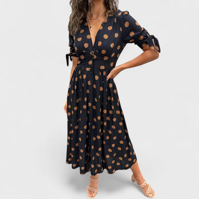 Monique - Elegantes gepunktetes Kleid
